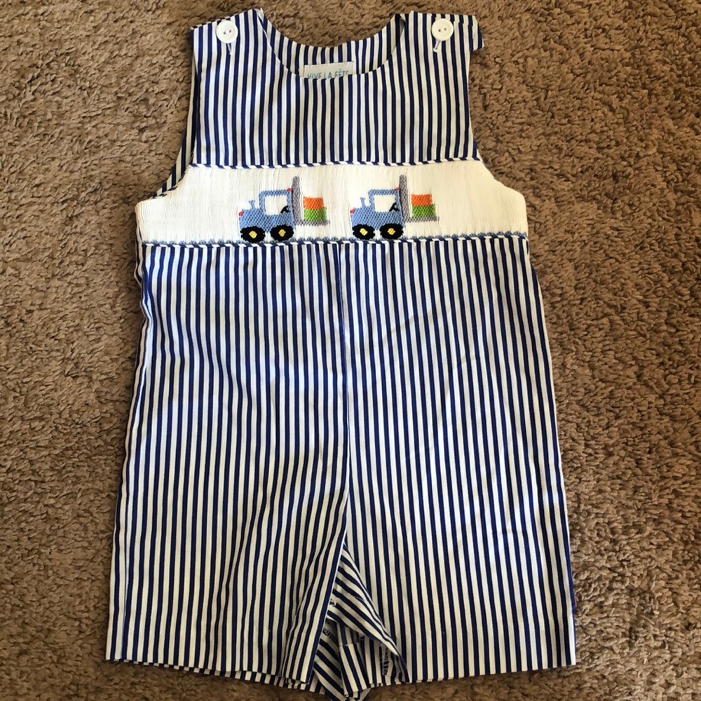 Adorable boy trucking outfit